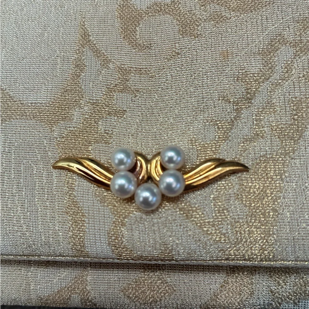 Mikimoto Cream Clutch with Gold Accents